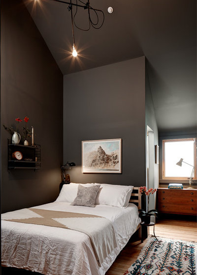 Eclectic Bedroom by Blue Sound Construction, Inc.