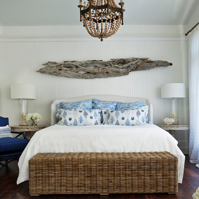 Bedroom - large coastal master dark wood floor and brown floor bedroom idea in Miami with white walls and no fireplace