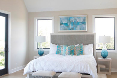 Inspiration for a modern master beige floor bedroom remodel in New York with beige walls