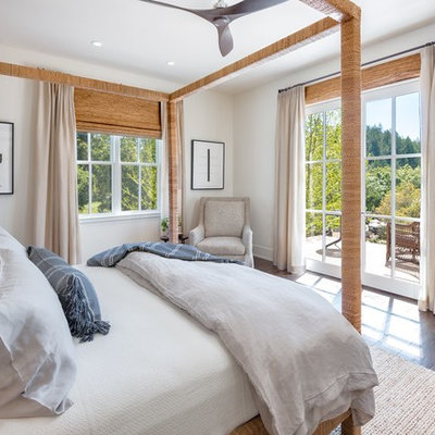 Bedroom - large coastal master dark wood floor and brown floor bedroom idea in San Francisco with no fireplace and white walls