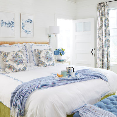 Inspiration for a mid-sized coastal master bedroom remodel in Portland Maine with white walls