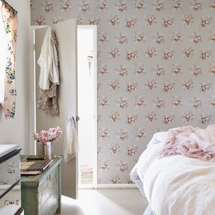 Cottage chic master bedroom photo in Los Angeles with multicolored walls