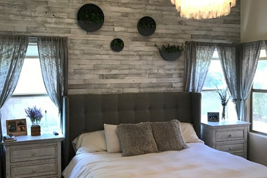 Inspiration for a farmhouse bedroom in Other with white walls.