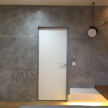 Bedroom and bath with microcemento walls