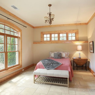 This is an example of a mid-sized arts and crafts bedroom in Atlanta with beige walls, ceramic floors and no fireplace.