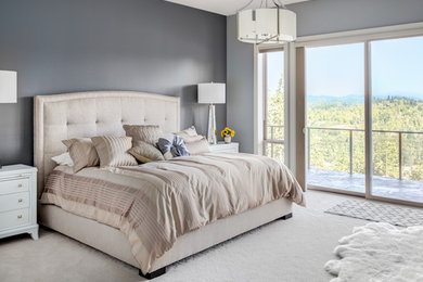 Bedroom - large contemporary master carpeted bedroom idea in Denver with gray walls and no fireplace