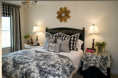 Mid-sized elegant guest carpeted and beige floor bedroom photo in Raleigh with black walls and no fireplace