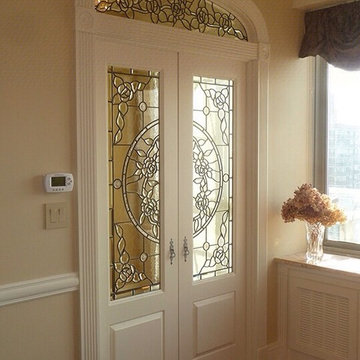 Bedroom entry beveled glass doors and transom