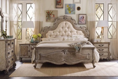 Inspiration for a large eclectic master dark wood floor bedroom remodel in Austin with white walls and no fireplace