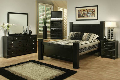 Example of a mid-sized master light wood floor bedroom design in Sacramento with gray walls and no fireplace
