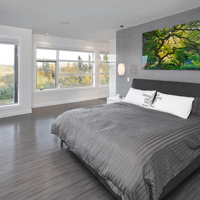 Inspiration for a contemporary bedroom remodel in Edmonton with gray walls