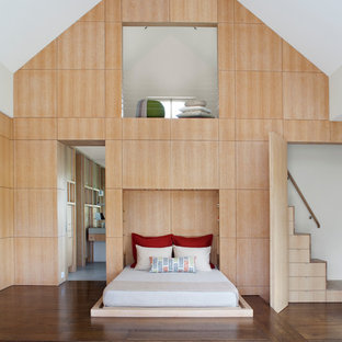 Inspiration for a contemporary guest dark wood floor bedroom remodel in San Francisco with white walls