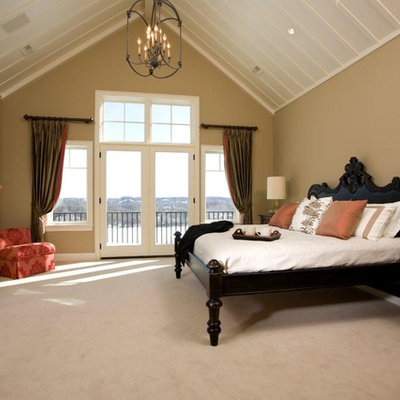 Inspiration for a timeless carpeted bedroom remodel in Minneapolis with beige walls