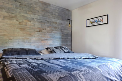 Design ideas for a medium sized urban master bedroom in Glasgow with brown walls.