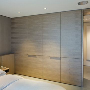 Bedroom with flat closet doors