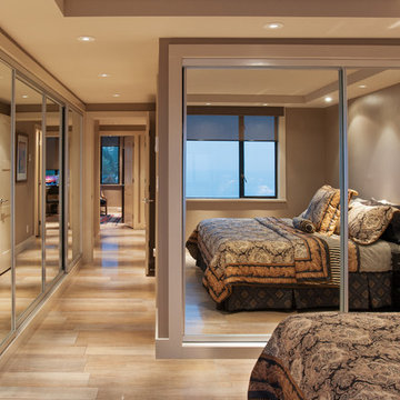 Bedroom With Mirrored Closets