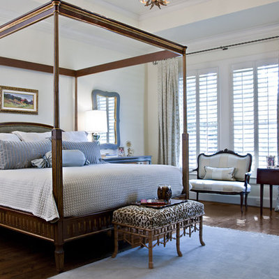 Example of a mid-sized classic master dark wood floor bedroom design in Dallas with white walls