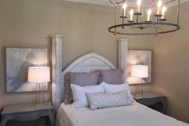 Inspiration for a small timeless guest bedroom remodel in San Diego with beige walls and no fireplace
