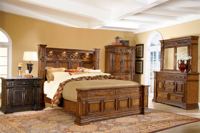 Example of a large classic master light wood floor and beige floor bedroom design in Baltimore with beige walls