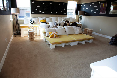Example of a large trendy loft-style carpeted bedroom design in Denver