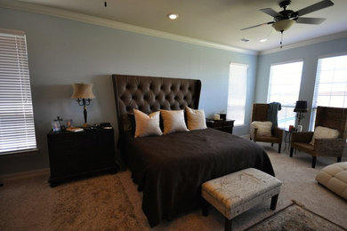 This is an example of a contemporary bedroom in Dallas.
