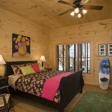 Bedrooms in a rustic round log home