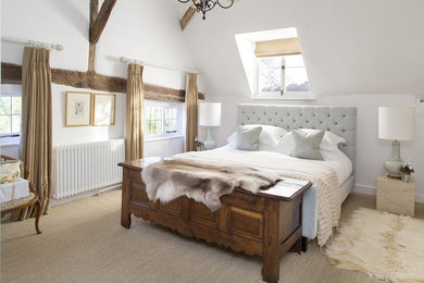 Contemporary bedroom in Berkshire with white walls.