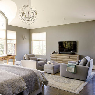 This is an example of a classic bedroom in Minneapolis with grey walls and dark hardwood flooring.