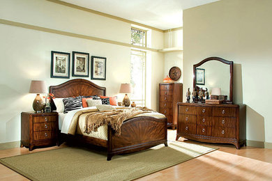 Inspiration for a mid-sized master light wood floor bedroom remodel in Minneapolis with white walls