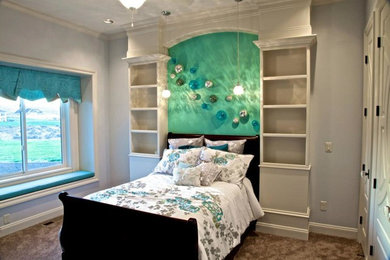 Example of a mid-sized beach style loft-style carpeted bedroom design in Seattle with gray walls and no fireplace