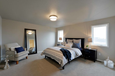 Example of a mid-sized country carpeted bedroom design in Minneapolis with beige walls