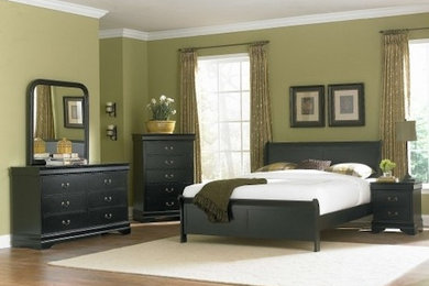 Large master medium tone wood floor bedroom photo in Other with green walls