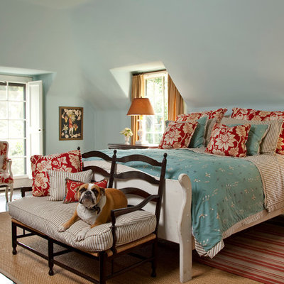 Elegant dark wood floor bedroom photo in Los Angeles with blue walls
