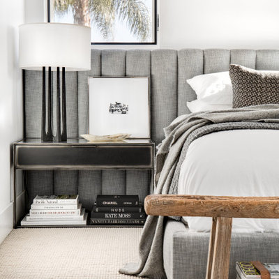 Mid-sized danish master carpeted and beige floor bedroom photo in San Diego with white walls