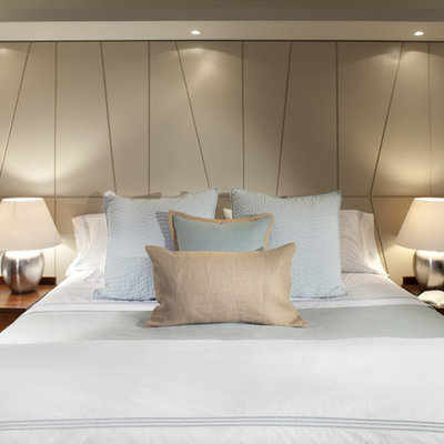 Inspiration for a contemporary bedroom remodel in Vancouver with beige walls
