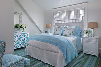 Inspiration for a mid-sized coastal master dark wood floor bedroom remodel in Other with white walls
