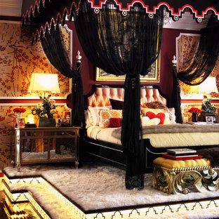 Example of a classic master bedroom design in Los Angeles with red walls