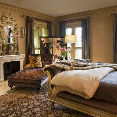 Bedroom - eclectic bedroom idea in Los Angeles with a standard fireplace
