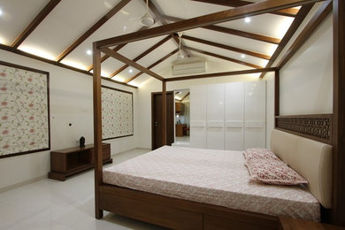 Design ideas for a modern bedroom in Ahmedabad.