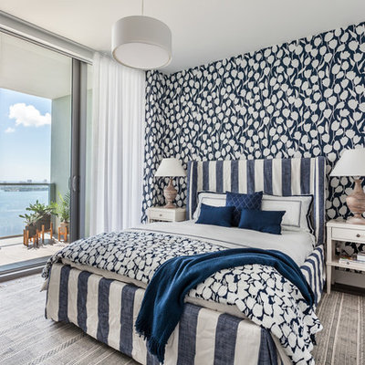 Inspiration for a mid-sized coastal guest bedroom remodel in Miami with blue walls