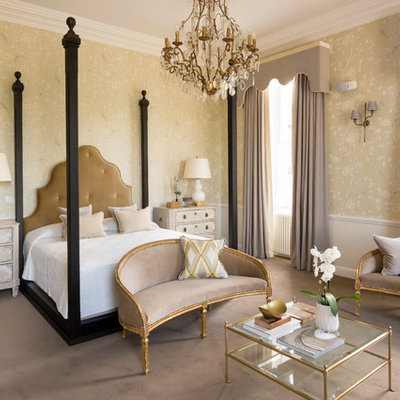Elegant master carpeted and beige floor bedroom photo in Dublin with white walls