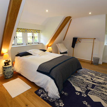 Blue and yellow guest bedroom - Thatch Cottage Extension in Wiltshire