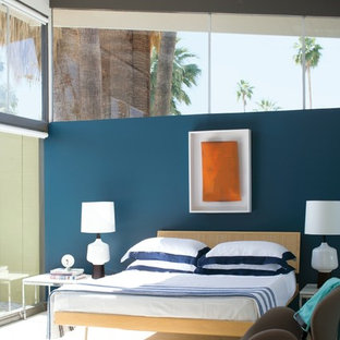 Bedroom - contemporary beige floor bedroom idea in New York with blue walls