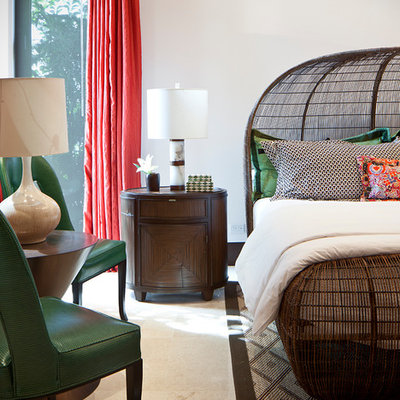 Bedroom - tropical master bedroom idea in Miami with white walls