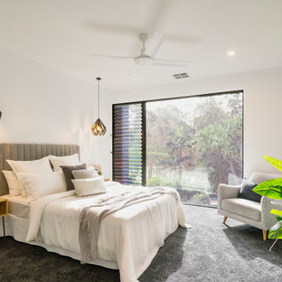 Inspiration for a contemporary guest bedroom in Sunshine Coast with white walls, carpet, no fireplace and grey floor.