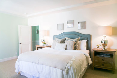 Inspiration for a mid-sized coastal guest carpeted bedroom remodel in Santa Barbara with white walls and no fireplace