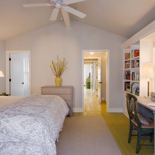 Photo of a transitional bedroom in Austin with grey walls and yellow floor.