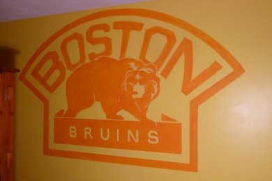 Boston Bruins mural, boy's hockey theme room.