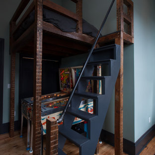 Foto de dormitorio contemporáneo con paredes azules