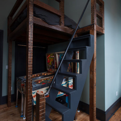 Inspiration for a contemporary bedroom remodel in Other with blue walls